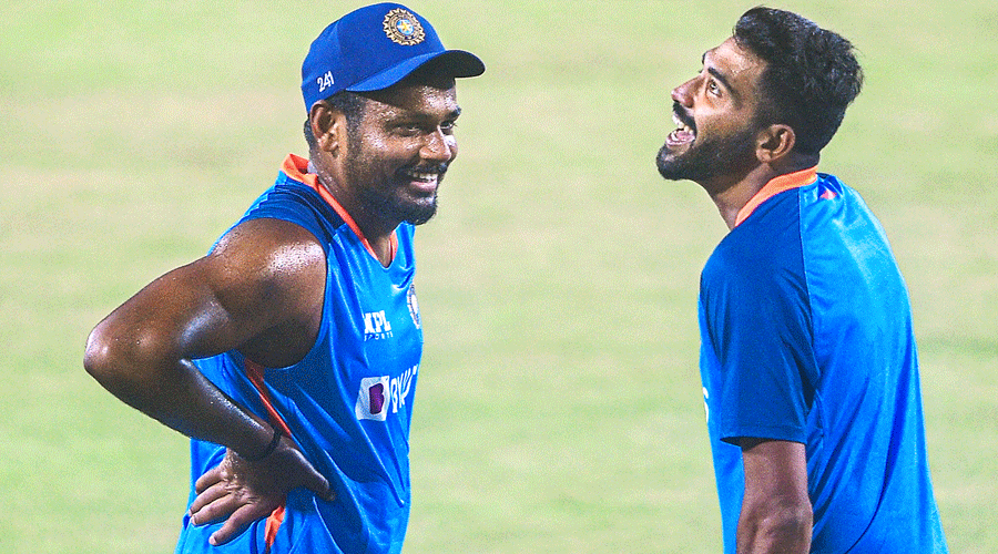 Sanju Samson and Mohammed Siraj at the JSCA International Stadium in Ranchi on Saturday.