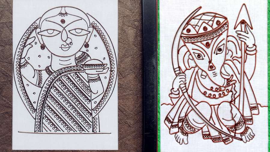 Durga and Ganesh figures Mandal has created with copper wires.