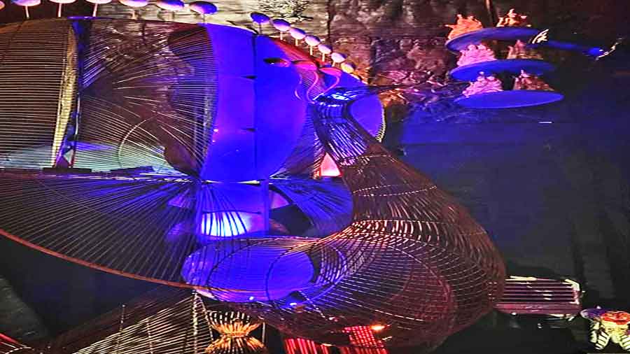 A peacock, Kartick’s bahan, made of iron rods.