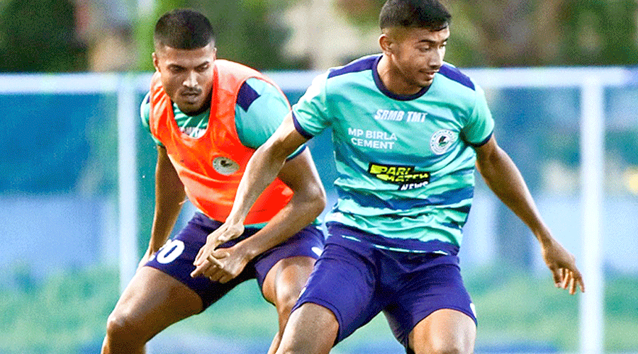 In a picture shared by ATK Mohun Bagan’s Twitter handle, Ashique Kuruniyan (right) and Pritam Kotal during a training session at the Salt Lake Stadium practice ground.