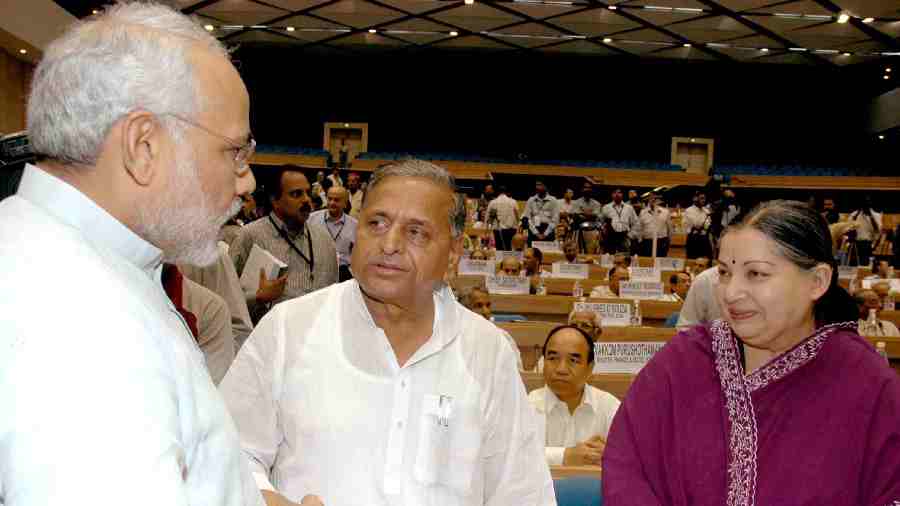 The then Chief Ministers of Gujarat, Uttar Pradesh and Tamil Nadu; Narendra Modi, Mulayam Singh Yadav and J Jayalalithaa having words at the 51st National Development council meeting in New Delhi on June 27, 2005.