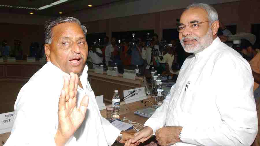 The then Uttar Pradesh Chief Minister Mulayam Singh Yadav with then Gujarat Chief Minister Narendra Modi at the meeting of standing committee of interstate council in New Delhi on March 29, 2005. 