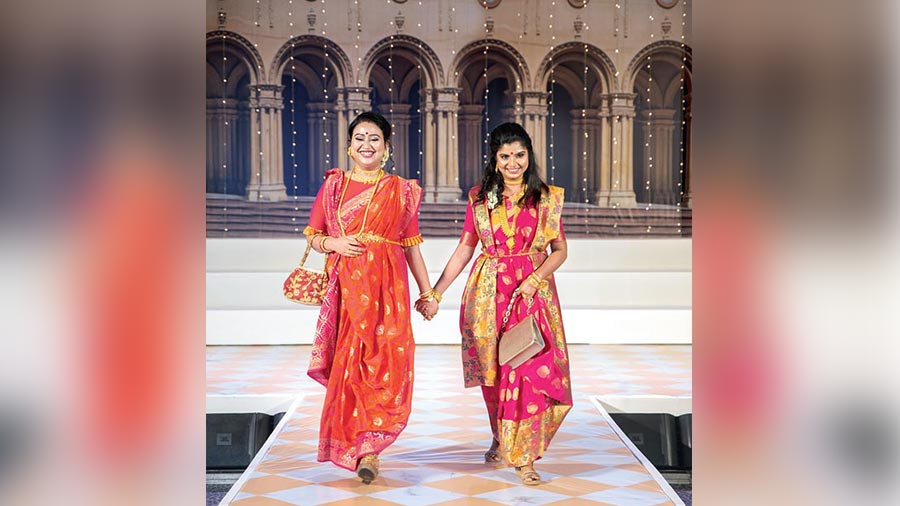 Dr Durba Biswas and Dr Ankita Prasad walk hand in hand.
