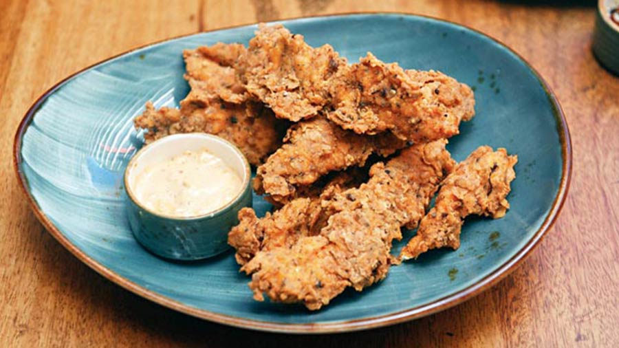 A wholesome Cajun Chicken Fingers which is light and crispy with tender chicken inside. It's not fried multiple times so as to retain the health element.