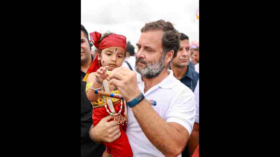 Rahul Gandhi with a child dressed as Lord Krishna