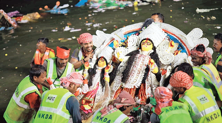 Idol immersion at Upasana Ghat in New Town on Dashami
