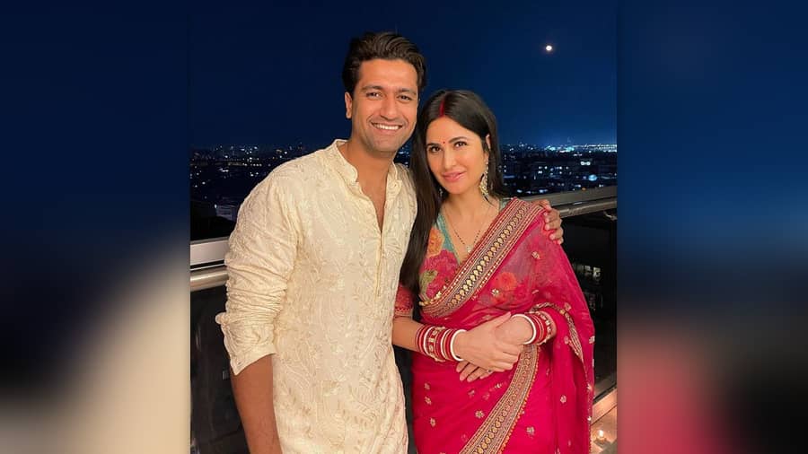 Vicky and Katrina pose together against the full moon. 