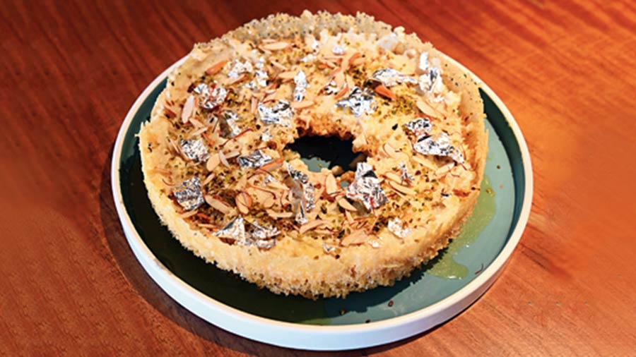 Ghewar: This popular Indian festive treat is a must-try. Made using cream and ghee along with oodles of dry fruits, this rich dessert is celebration on a plate. It is also available in rose flavour.