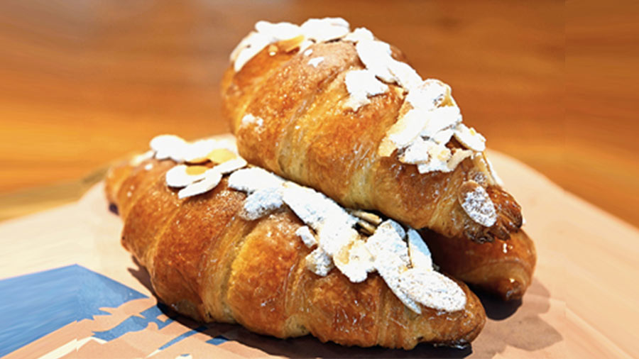 Almond Croissant: The classic glazed croissant gets a gooey almond meal, eggs and marzipan mixture filling to create this treat.