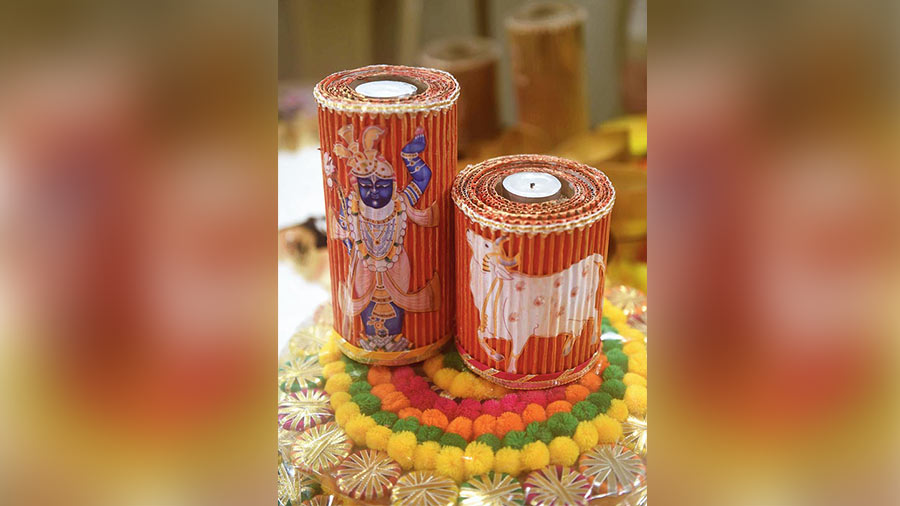Made of corrugated sheets, this eco-friendly tea-light holder from Utopia makes for a unique gift item for Diwali or at a pre-wedding celebration. It is hand-painted in ethnic designs and varnished to give a smooth finish. Rs 300 for a set of two