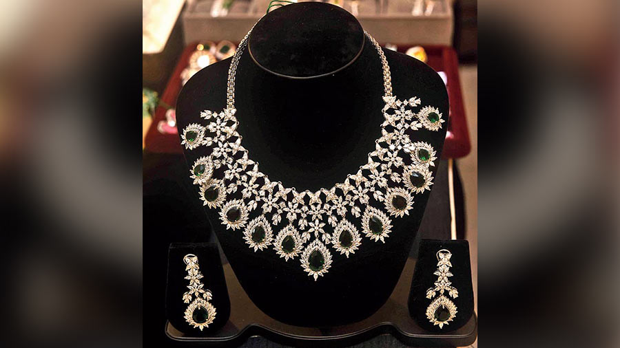 If you’ve been invited to a destination wedding abroad and are unwilling to carry your expensive jewellery, this silver necklace and earrings set encrusted with zircon stone and emerald from Style Addict is just what you want to wear at your favourite cousin or BFF’s wedding. Price: Rs 9,500