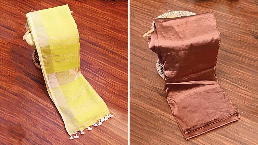 #Hotpick: A pastel yellow linen sari with zari border for day wear and a copper tissue sari with embroidered scallops for Diwali evening.