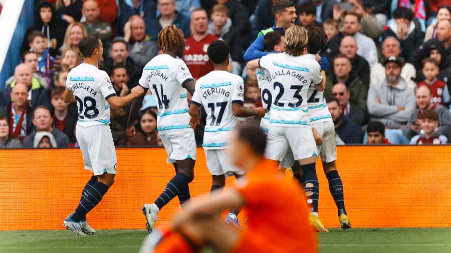 Chelsea players celebrate a goal