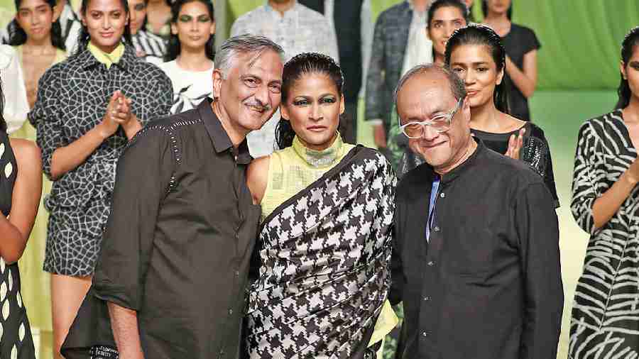 (L-R) Rakesh Thakore, Carol Gracias and David Abraham at Lakme Fashion Week in partnership with FDCI.The supermodel walked in a stunning sari, as much a  statement as her bold eyes.