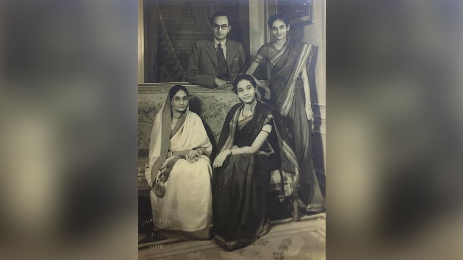 Roma (sitting) with mother Bivabati, brother Sisir and sister Chitra in Paris 1948