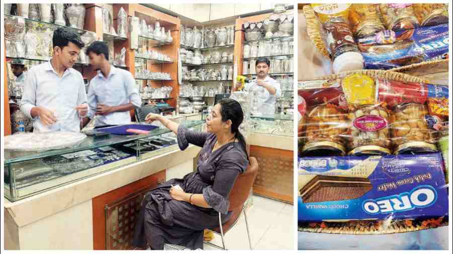 A woman checks out latest offerings at Jalan’s Glint and Glitters in City Centre. (Right) Festive baskets at Bhikharam Chandmal. 