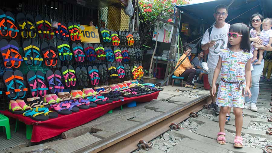 Tourists at Maeklong Rail Market 