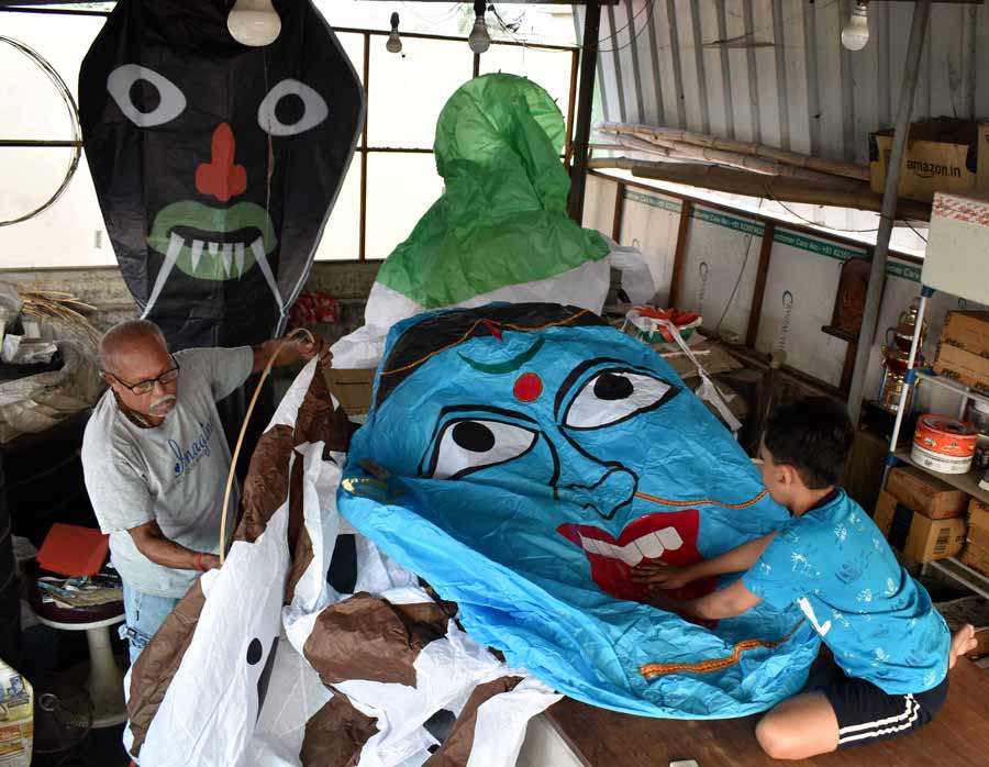 Gigantic hot-air balloons (phanush) made of paper with a bamboo and wire base are being readied for Kali Puja celebrations in North Calcutta on Friday.