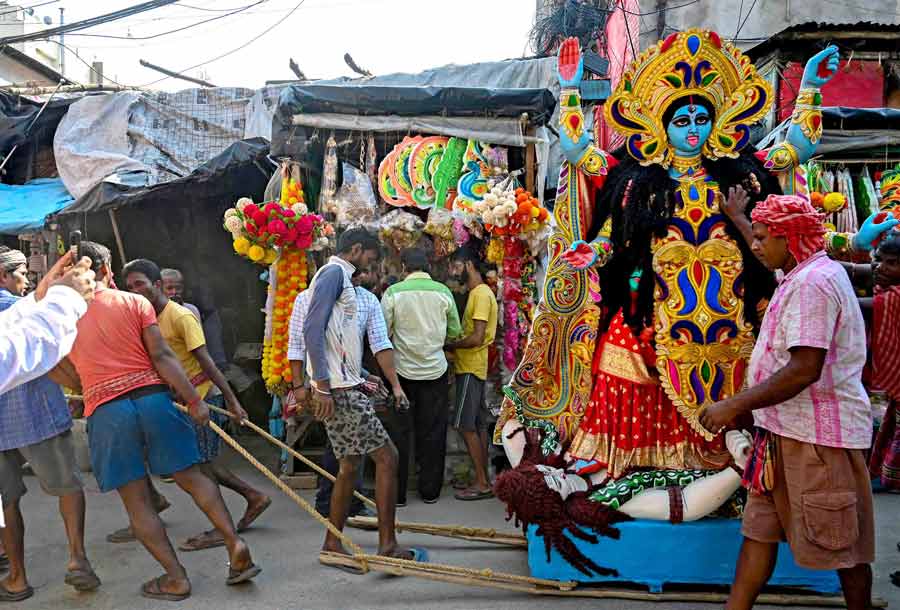  A Kali idol being ferried out of Kumartuli on Saturday