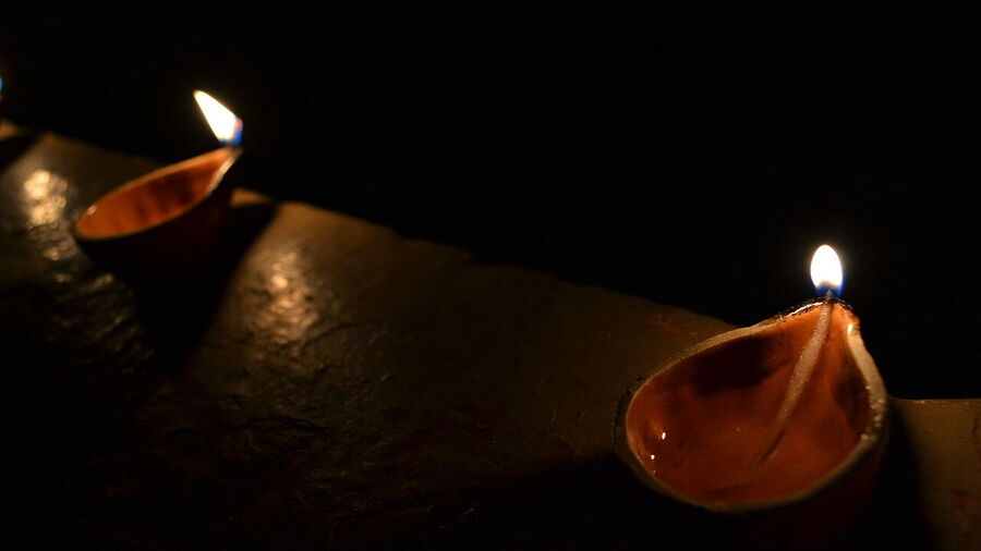 Diyas on windowsills on Diwali night