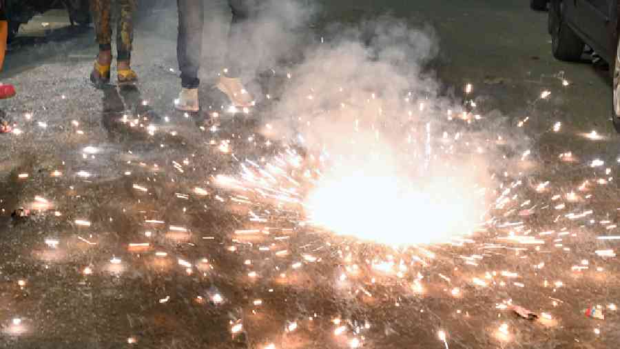 Firecrackers being burst on Central Avenue on Monday evening. 