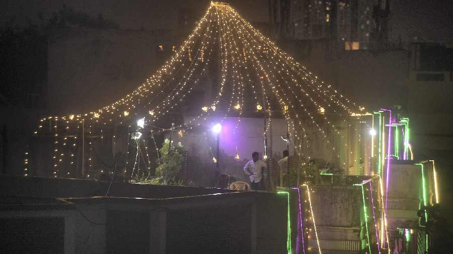 Roof of a building decorated with colourful lights, in Calcutta