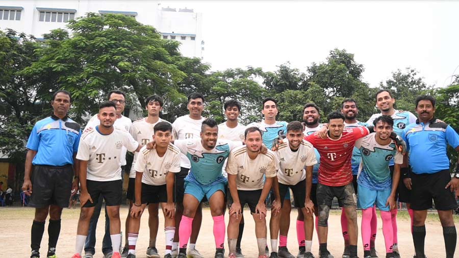 The players of Auxilium Church and Calcutta Celebration Church pose after an intense final