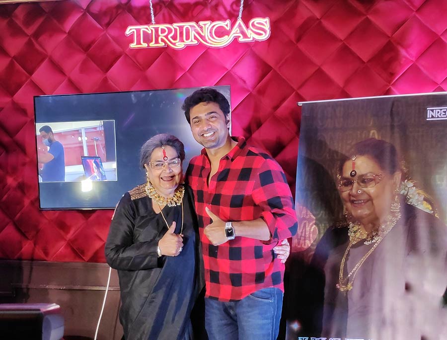 Usha Uthup poses with actor Dev at the launch of her upcoming song ‘Mon manche na amar’ at Trincas, Park Street on Wednesday