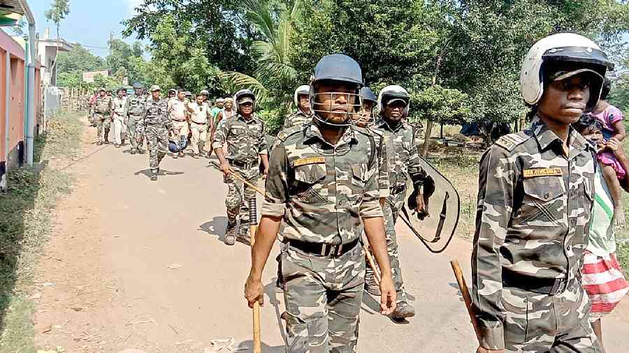 Police personnel arrive to quell the protest by the angry residents of Morkha village in West Midnapore on Wednesday. 
