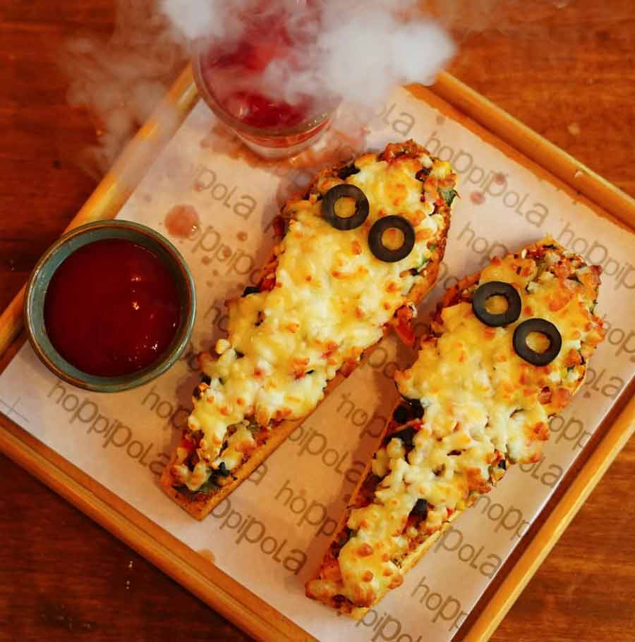 Coffin Cheese Bruschetta from Hoppipola: The popular drinking den in Acropolis Mall has a special appetiser for the spookfest. The special is a classic bruschetta — toasted Italian bread drenched in olive oil and served with garlic, tomatoes and cheese — shaped like a ghost with olives for eyes