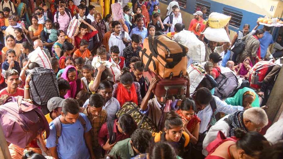 Crowded Patna Junction railway station as people leave for their hometown for the upcoming 'Chhath Puja' festival in Patna