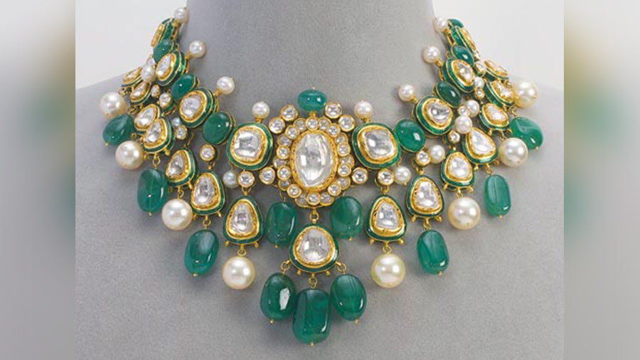 A polki necklace with diamonds and Zambian emeralds, this designer adornment is crafted in the style of jewellery worn by the ladies of Rajasthan’s royal families.