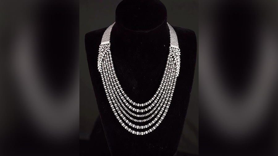 This elegantly styled statement diamond necklace in multiple strands is one of Chirag’s signature designs and is a one-of-a-kind piece that can be teamed perfectly both with a sari and a gown.