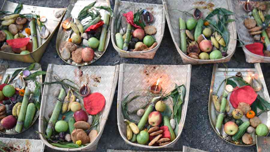 Offerings for Chhath Puja near a Jodhpur Park lake on Sunday evening. 