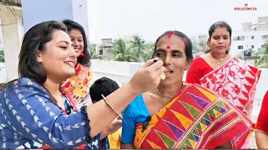 Actress Poushmita Goswami (left) with Susama Mondal in a still from a YouTube video 