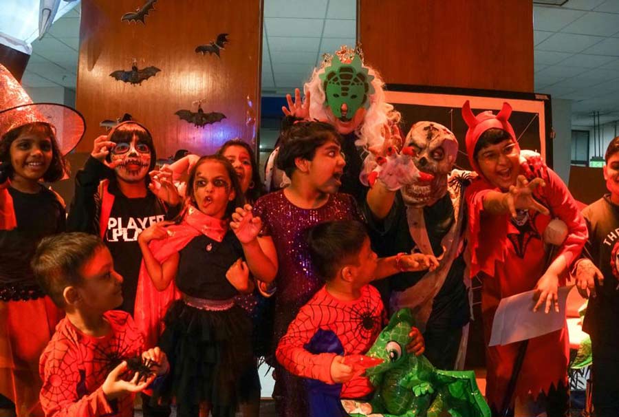 Students aged 5 to 12 trooped in at American Center dressed in their ghostly best