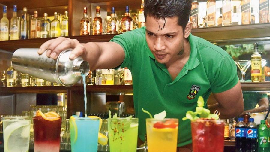 Mixologist Siddhartha Das crafting the LIIT glasses with ease