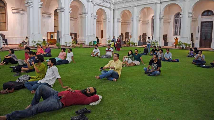 The audience at Indian Museum get comfortable during the concert 