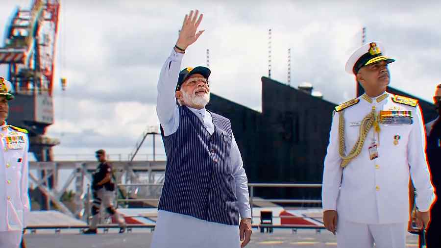 Prime Minister Narendra Modi with Chief of Naval Staff Admiral R. Hari Kumar during the commissioning ceremony of the first indigenously designed and built aircraft carrier, INS Vikrant, at Cochin Shipyard Limited in Kochi