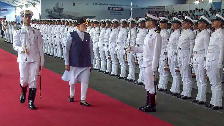 Prime Minister Narendra Modi inspects a Guard of Honour during the ceremony