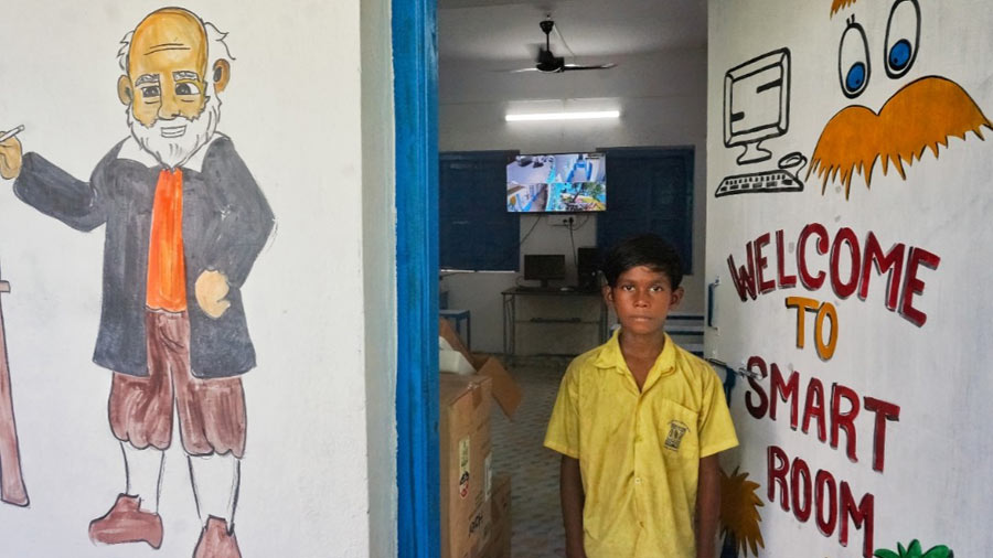 A student at the Kolkata Municipal Corporation Primary (KMCP) School at Dhapa, Kachari Para, on Friday. The school has a smart classroom which provides e-learning.