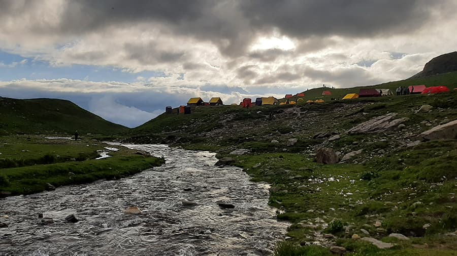 The campsite at Rola Kholi at 12,500ft and the picturesque stream that flows past it. The sound of the water and the sights around rejuvenated us body and soul