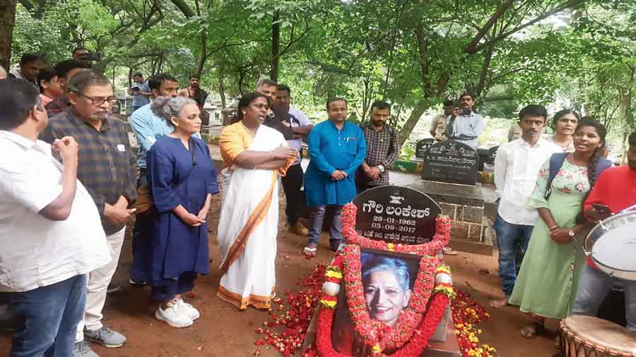 Author Arundhati Roy and others at the grave of Gauri Lankesh in Bangalore on Monday on the fifth anniversary of the journalist’s death.