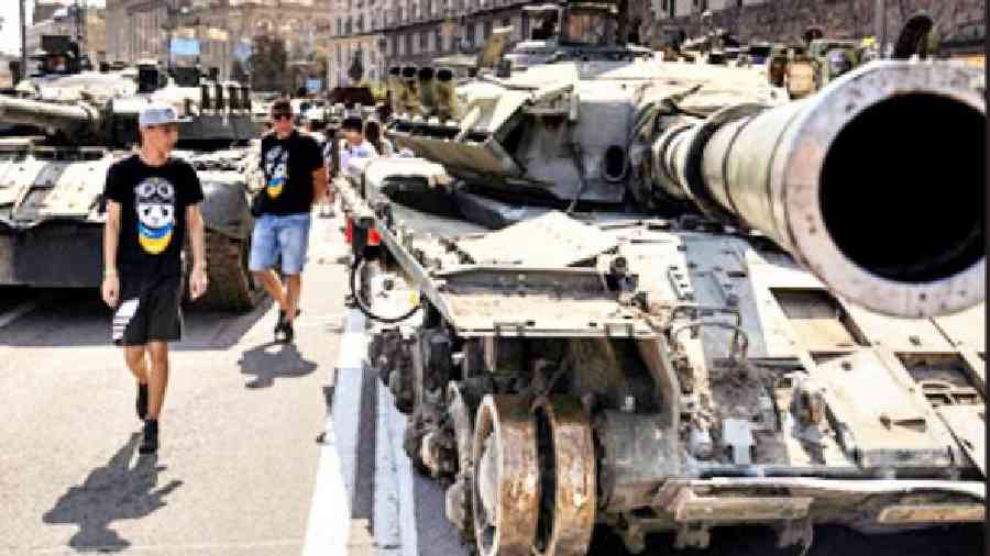 Ukrainians visit an exhibition of destroyed Russian military vehicles and weapons in the centre of Kyiv.