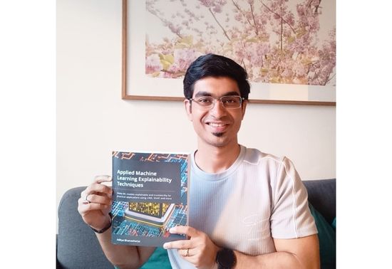 Aditya with his debut book recently published and available on Amazon