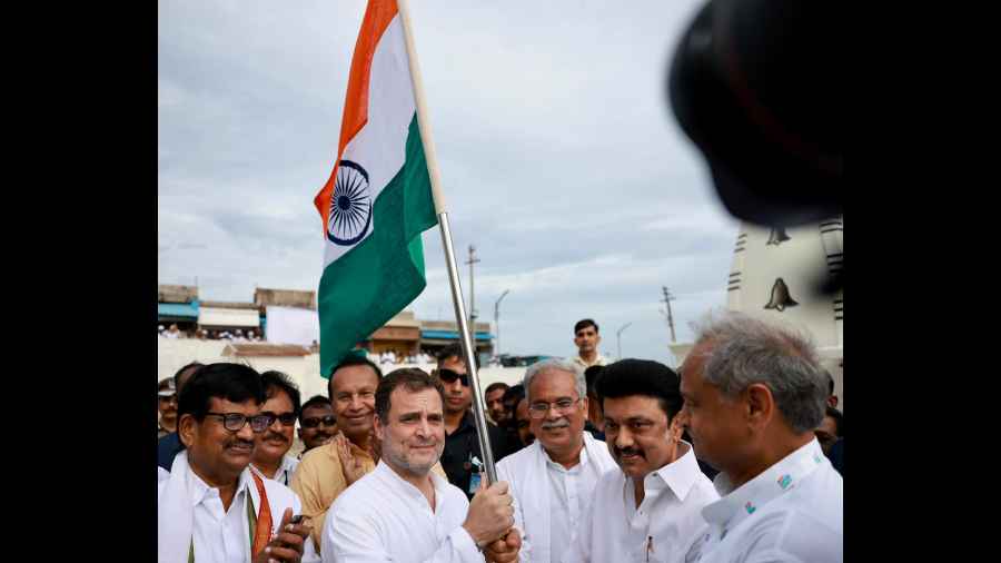Tamil Nadu CM MK Stalin hands over the national flag to Rahul Gandhi