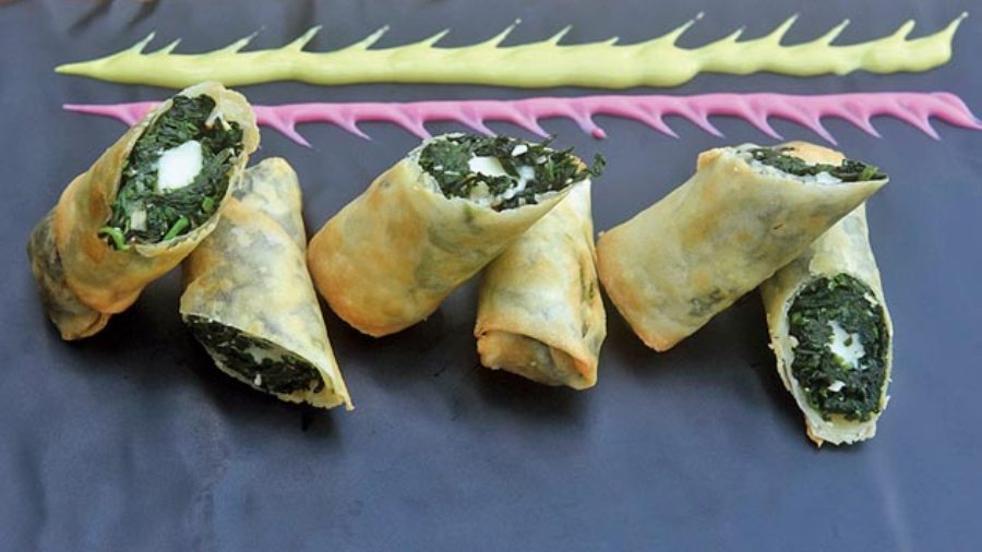 Cheese Spinach Roll: Creamy spinach with luscious cheese inside and wrapped in flaky filo makes this one a great starter.