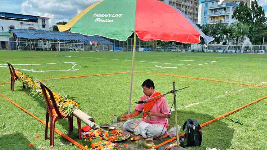 The priest worships the khuti at IB Block