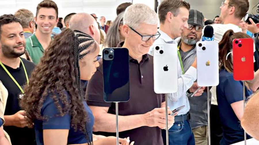 Apple CEO Tim Cook interacts with the media after the launch of the new iPhones at Apple Park in Cupertino on Wednesday. 