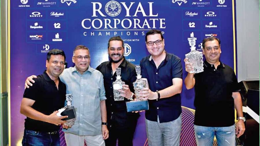 Nett Winning Team: Flying Tigers — Manaksia Steel — Vishal Singhania, Pratik Lakhotia, Kanishka Sethia and Vineet Agarwal with RCGC captain Rohan Ghosh (second from left).